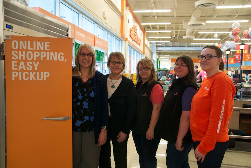 From left: Cathy MaGee, Donna Davidson, Barbie Dunphy, Donna Harris and Kristine Keddy are part of the New Minas Superstore's online grocery shopping prep team, many of whom have started using the service themselves.