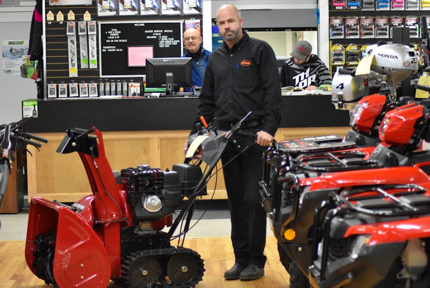 G. W. Sampson Co. Ltd. general manager Matthew Bonnyman showcases an example of what the five snowblowers stolen from the Kingston business recently look like.