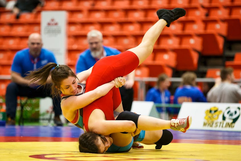 Wolfville resident Makayla Levy, upright, is heading to the United World Wrestling Pan American Games as a member of Team Canada in May.