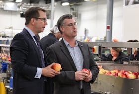 Kings-Hants MP Scott Brison, left, and Scotian Gold president and CEO David Parrish tour the new production technology at Scotian Gold in Coldbrook. Brison visited Oct. 27 to officially announce $1.75 million in federal government funding toward a 28,000 square foot expansion at Scotian Gold that has been in production since the spring of this year.