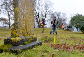 Steve Garcin of Boreas Heritage Consulting operates the ground-penetrating radar unit at the Saint Jean Baptiste Parish Cemetery that later became the British Garrison Graveyard at Fort Anne in Annapolis Royal.