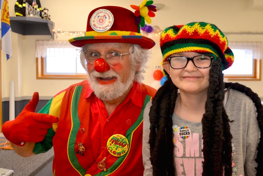 Milo ‘T’ Clown and Olivia Carson yukked it up during an April 20 party to celebrate the young Nictaux girl’s victory over cancer. She rang the bell to signify a cancer-free diagnoses a couple of months ago. The party at the Annapolis Royal Fire Hall closes a sad and painful chapter in her life and allows her to move on.