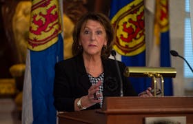 Nova Scotia Finance Minister Karen Casey answers questions from reporters about the 2020 budget at Province House on Tuesday, Feb. 25, 2020.