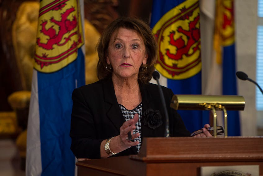 Nova Scotia Finance Minister Karen Casey answers questions from reporters about the 2020 budget at Province House on Tuesday, Feb. 25, 2020.