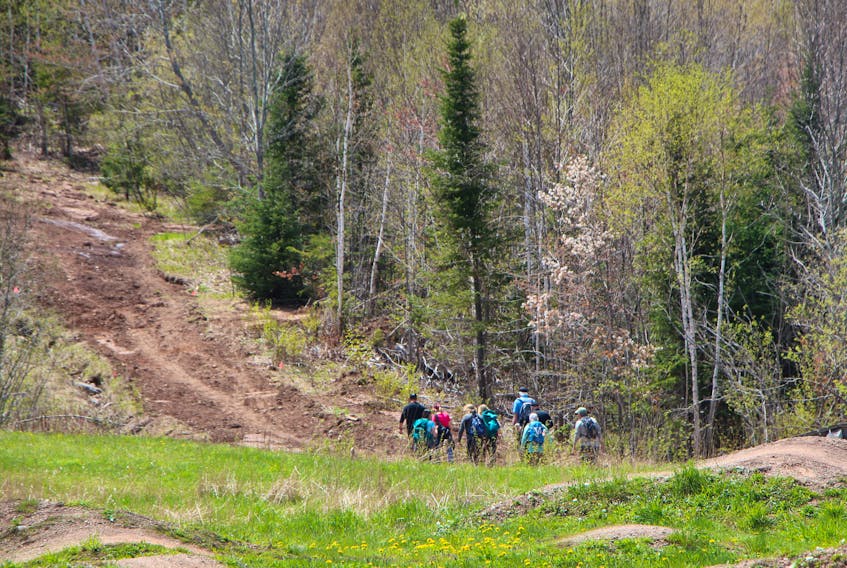Hikers start out for a spring time hike at Keppoch Mountain. The popular activity returns Oct. 26 with a guided hike scheduled at the location.