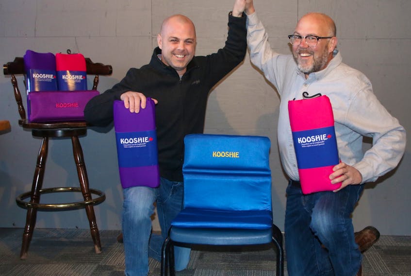 Mark Shelley, left, and Greg Johnston are partners in Kooshie Cushions of Canada Limited. Shelley made the first cushion for an entrepreneurial course in school.