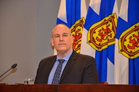 Finance Minister Labi Kousoulis talks about the provincial budget with media at One Government Place in downtown Halifax on Thursday, March 18.