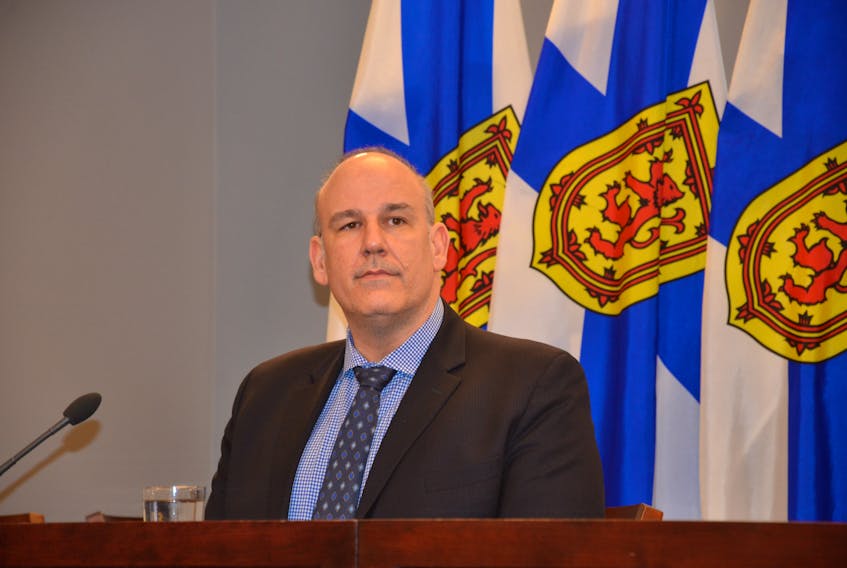 Finance Minister Labi Kousoulis talks about the provincial budget with media at One Government Place in downtown Halifax on Thursday, March 18.