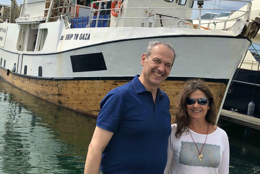 Dr. Majed Khraishi with Emilia Nacher, who piloted the boat Al-Awda, in Lisbon.