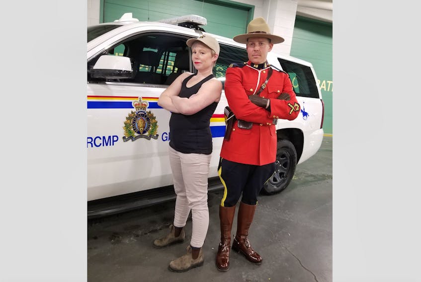 Cancer survivors Constable Christopher Jones, Happy Valley-Goose Bay RCMP, with Susan Ralph, model in Breastless and Beautiful calendar.
