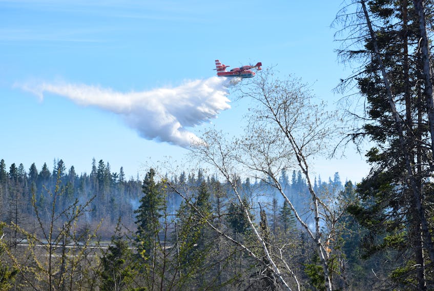 Water bombers were called in to assist with the fire on the boardwalk on Sunday, June 17.