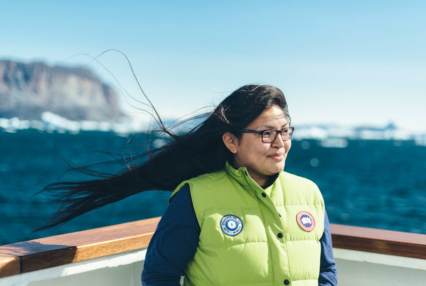Petshish Jack, 24, from Sheshatshiu, aboard the expedition vessel near Uummannaq, Greenland. She will be able to use her experiences from Students on Ice in her career in travel and tourism.