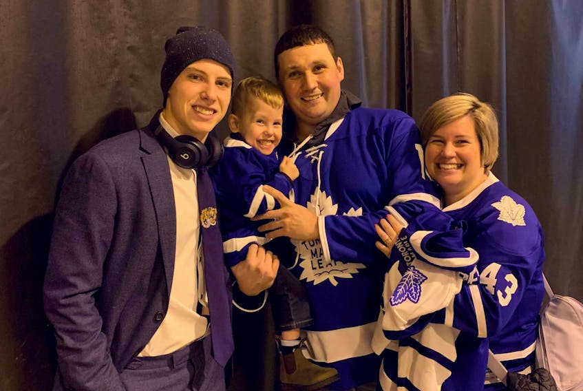 Four-year-old Michael Carroll got to meet his hero, Toronto Maple Leaf Mitch Marner (left) when he attended a NHL game in Montreal with his parents Sheldon and Selina Carroll.