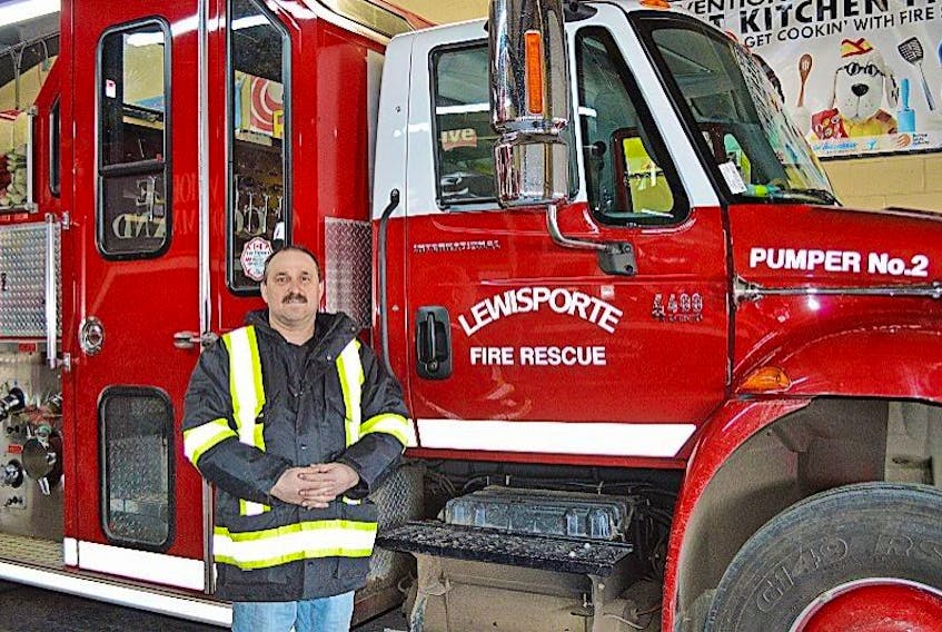 Lewisporte Fire Rescue Chief Rob Fudge pictured with one of the department’s pumper trucks is one of the many people working towards making regional fire services a reality.