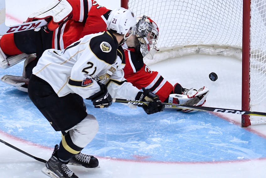 Charlottetown Islanders veteran forward Pascal Aquin scores one of his goals Tuesday past Quebec Remparts goalie Antoine Samuel in Game 7 of their Quebec Major Junior Hockey League first round playoff series. Yan Doublet/Le Soleil