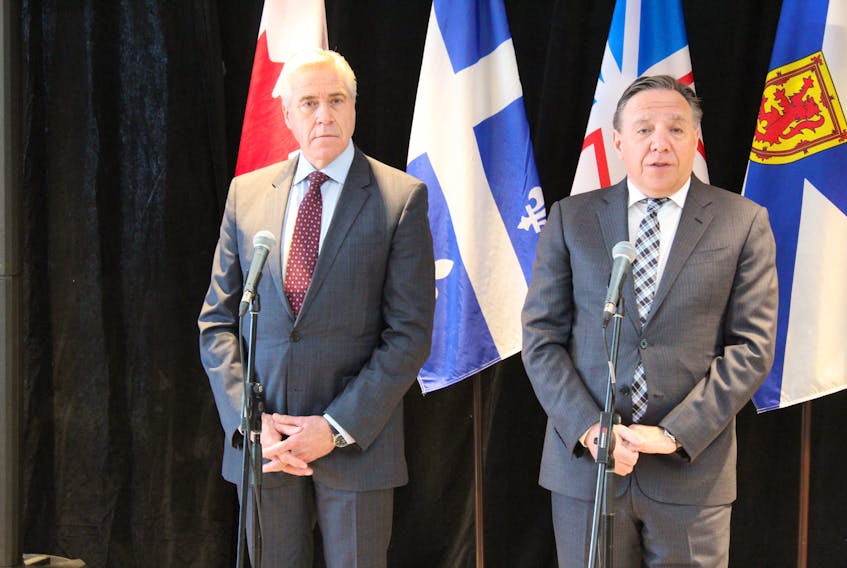Premier Dwight Ball and Quebec Premier Francois Legault (right) speak with reporters in St. John's on Monday. DAVID MAHER/THE TELEGRAM
