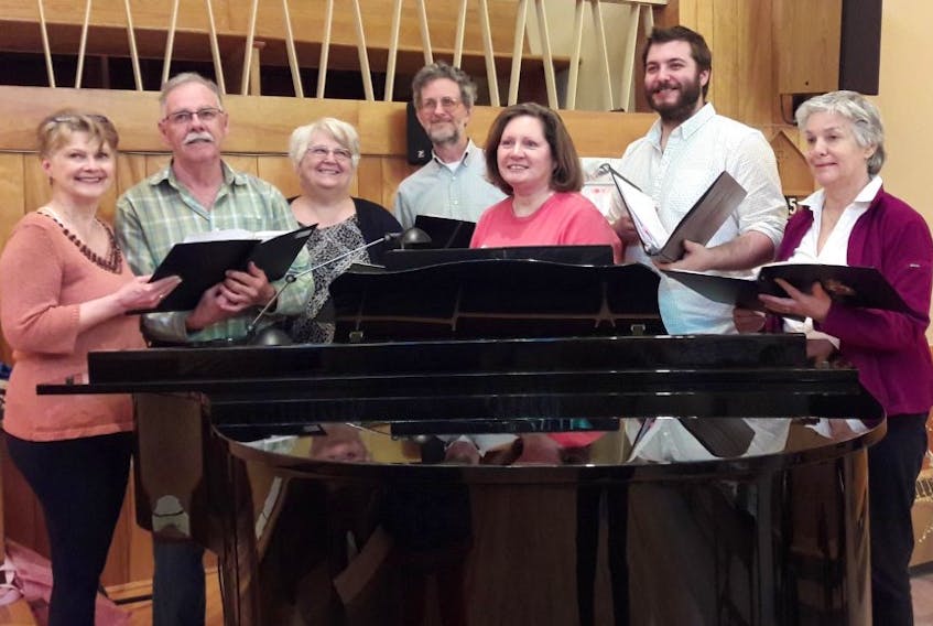 Several Charlottetown Legion Choir members along with Teachers in Harmony and Friends singers rehearse sea-faring songs for their spring concerts. From left are Rowena Stinson, Frank McQuaid, Colleen Murphy, Tony Reddin, accompanist Linda Shukri, director Travis Boudreau, and Debbie Doyle.