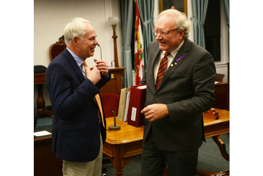Green Leader Peter Bevan-Baker, left, and Premier Wade MacLauchlan share a laugh and seasons greertings following the closure of the third session of the 65th General Assembly on Wednesday. The closure saw MLAs in a jovial mood following a month of sometimes heated debate on a range of Island issues including mental health and affordable housing strategies, regulations surrounding P.E.I.’s Water Act and Municipal Government Act and the ongoing controversy of the former entrepreneur stream of the Provincial Nominee Program.
