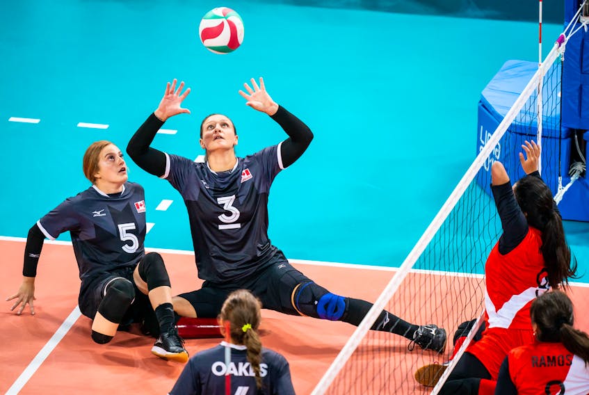 Canadian captain Danielle Ellis (3) prepares to set a ball during action at the 2019 Lima Para Pan Am Games. Looking on is teammate Payden Olsen  (5).  Canada is hosting the Paralympic sitting volleyball 2020 Tokyo qualification tournament that begins on Wednesday at the Canada Games Centre. CONTRIBUTED
