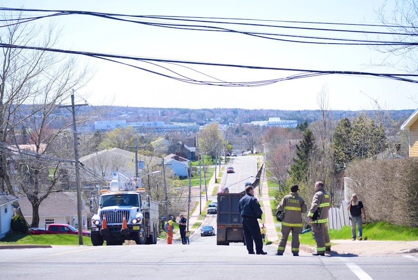 Lines could be seen twisted and loose after an industrial truck collided with multiple utility lines on Glenwood Drive Tuesday, leaving a few live wires on the ground. Truro Police and Fire services were quick to shut down the road, allowing for NS Power, Bell Aliant and Eastlink to repair the lines.