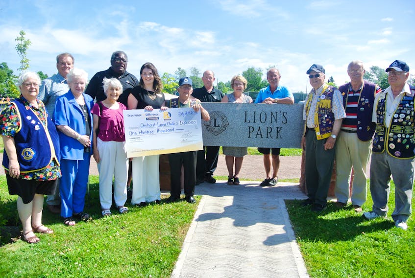 The Community Credit Union has made a $100,000 contribution to the Amherst Lions Club for the continued development of its park property on Hickman Street. Among those participating in the presentation were: (front, from left) Deborah Millard from the Amherst Lions Club, Community Credit Union past chair Charlotte MacVicar, vice chair Jean Costin, branch and community development manager Sarah Doyle, King Lion Ken Mattix, Lions Art ‘Sonny’ Foster, Phil Baxter and Rubin Millard, (back, from left) Community Credit Union board chair Howard Welch, board member at large and town councilor Darrell Jones, town councilor Terry Rhindress, Deputy Mayor Sheila Christie and Mayor David Kogon.