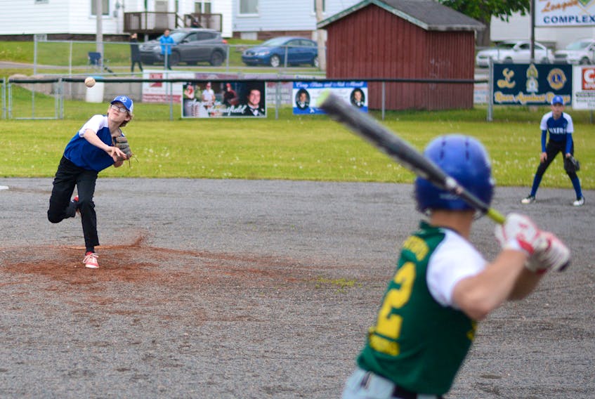 Mixers pitcher Aidan McBurnie delivers a pitch to Cubs' batter Kieran Sears in Amherst Little League A action on Wednesday.