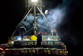 Before daybreak hits, lobster fishermen in southwestern Nova Scotia prepare to depart from the wharf in Pinkney’s Point, Yarmouth County. Dumping day, as the season's first day is called, marks the start of the country’s largest lobster fishery.