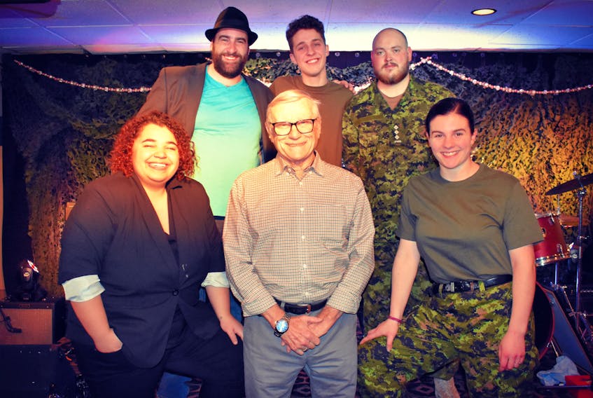 Lt.-Col. Dennis Hopping, pictured front and centre with the Feast Dinner Theatre cast of the Summerside venue.