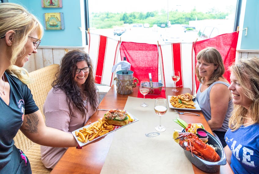 Capt. Kat’s Lobster Shack in Barrington Passage is a one-of-a-kind spot known for its award-winning lobster roll and creamy lobster fondue. - Photo Courtesy Tourism Nova Scotia / Photographer: Acorn Art Photography.