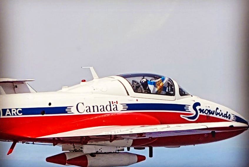 A Nova Scotia flag flown inside a Snowbirds jet by Truro-area native Matt Mackenzie, is being auctioned off on eBay as a fundraiser for the NS SPCA in memory of the team's publicity officer and Halifax native Capt. Jennifer Casey, who died in a recent crash.