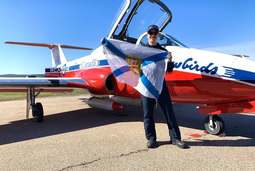 Matt Mackenzie, a Truro-area native and aircraft structural technician with the Canadian Snowbirds, is auctioning off a Nova Scotia flag he recently carried with him during the team's visit to the province as part of Operation Inspiration. Proceeds from the eBay auction are to go to the NSSPCA in memory of Capt. Jennifer Casey, a Snowbirds public relations officer who recently died when the jet she was in crashed in B.C.