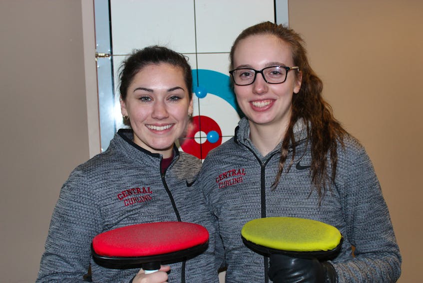 Mikayla Tuck, left, and Jessica Jacobs are lifelong friends who decided to pick up the sport of curling to have an opportunity to compete in the Newfoundland and Labrador Winter Games.