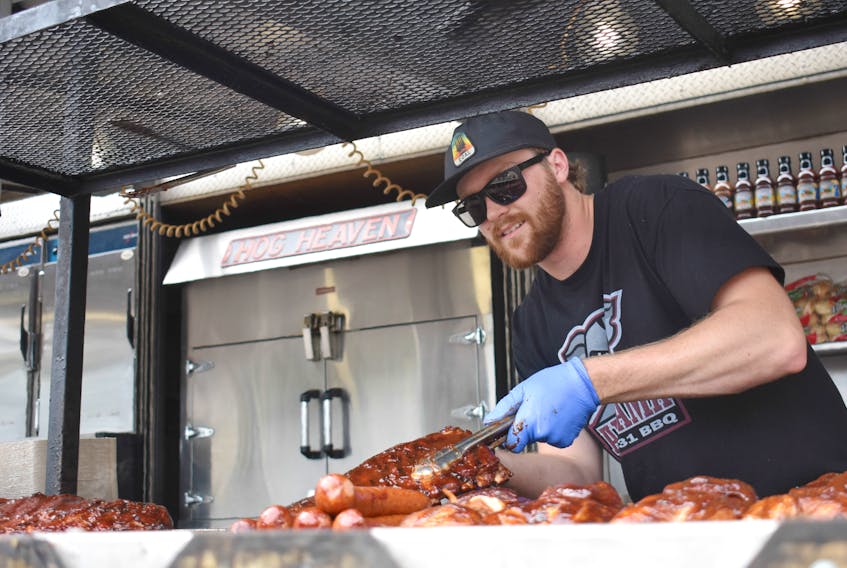 Mitchell Russell was manning the grill for Camp 31 at the Pictou County Ribfest.
