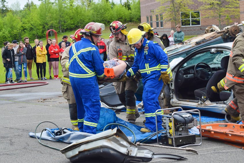 First responders put on a mock accident demonstration at Northumberland Regional High School to warn graduating students of the dangers of drinking and driving.