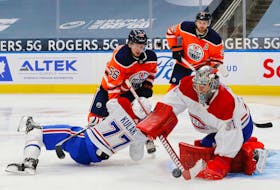 Montreal Canadiens goaltender Carey Price makes a save on Edmonton Oilers winger Kailer Yamamoto during a recent NHL game in Edmonton.