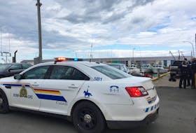 RCMP were at Beach Point Wharf on Saturday after two men died during a collision between two fishing boats.