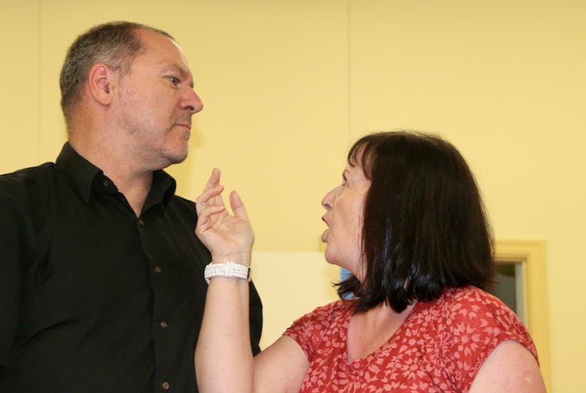 Carl Goodwin, as Macbeth, and Linda Finnie, as Lady Macbeth, rehearse a scene for Shakespeare in the Park. Performances will be held in Victoria Park July 24-26.