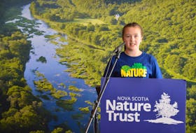 Maeve Boyne, 12, speaks at a news conference Monday, Sept. 21, to promote the Nova Scotia Nature Trust's goal of raising $4 million in donations and doubling the amount of land it has protected in the last quarter century by 2023.