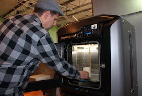 Matt Swan, the director of Nova Scotia Power Makerspace, demonstrates one of the 3D printers available at the new workspace dedicated to entrepreneurs, crafters, artisans and students at the New Dawn Centre for Social Innovation. The site officially opened to the public on Monday and will be open Monday to Friday from 9 a.m. until 5 p.m. during its first week of operation so that members of the community can check out the space.