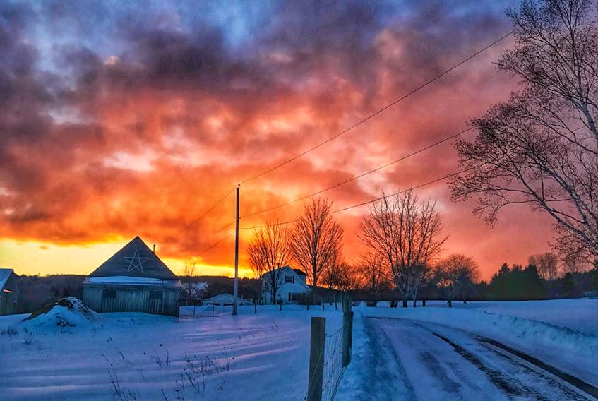 Bernice MacDonald captured a very moody sky over the farm of Diane and Sandy MacDonald.  Bursts of flurries filled the air as the sun lowered over James River in Antigonish County N.S. We've lost some snow since this photo was taken but there could be more on the way.