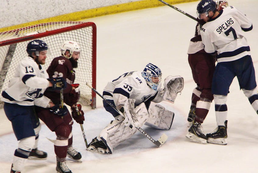 St. F.X. X-Men goaltender Chase Marchand pictured in AUS semi-final action versus the St. Mary’s Huskies last month. After the X-Men lost the opening two games, Marchand became a brick-wall and brought his team all the way back to win the series against the favoured Huskies.
