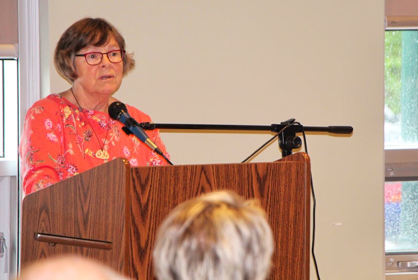Mary Ellen Clancy addressing the crowd during her well-attended book launch, Sept. 11, at the People’s Place Library.