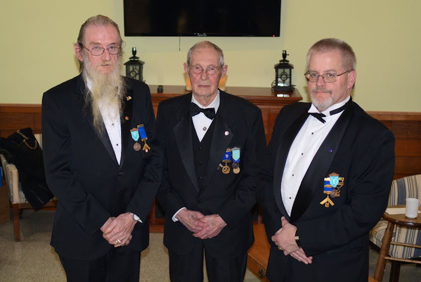 The Masons hosted an awards dinner at the Acacia Lodge #8 on March 7 to recognize (from left) Charlie McWhirter, Don Ripley, and Allan Chapman for their service to the Masons.