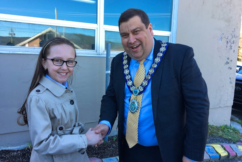 Keira Clarke (left) meeting with Mayor Jim Parsons (right) before her official duties as Mayor begin. Keira was the winner in the grade six Mayor For A Day Essay Contest.