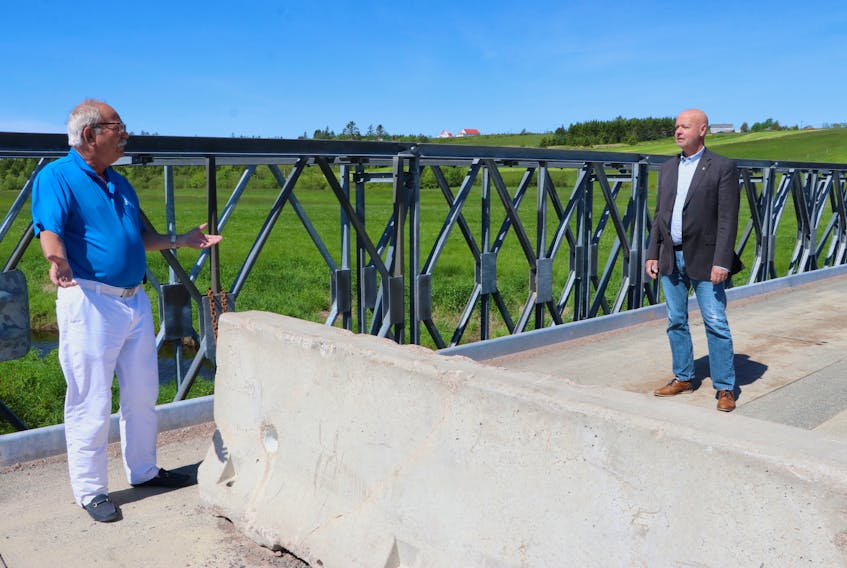 Amherst Mayor David Kogon (left) and Sackville Mayor John Higham met at the closed border on the Mount Whatley Road on June 16 to discuss ways to convince their respective provinces that it was time to reopen the Nova Scotia-New Brunswick border. Tom McCoag / Town of Amherst