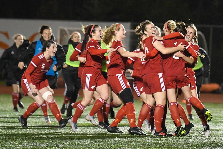 The Memorial Sea-Hawks celebrate their shootout win in Thursday's quarter-final round of the AUS women;s soccer championship tournament in Sydney, N.S. — Memorial Athletics/Twitter