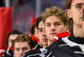 Dawson Mercer, shown on the QMJHL bench during the Canada-Russia series last month, has taken a confident attitude into Canada's selection camp that will determine this country's team at the 2020 world junior hockey championship. — chlcanadarussia.ca