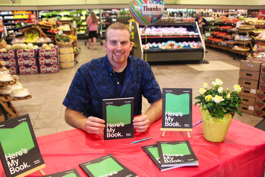 Autism and an intellectual disability didn’t prevent Michael Jacques from authoring Can’t Read, Can’t Write, Here’s my Book. He is pictured at Sobeys in Antigonish, July 16, during a Nova Scotia book tour.