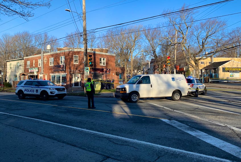 Halifax police had the intersection of Robie Street and Lady Hammond Road blocked off early Monday morning, Nov. 30, 2020 after a man's body was found in the bushes outside a building.