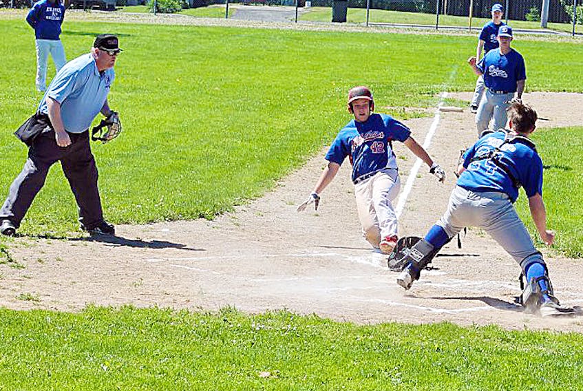 Brady Crowe of the Amherst Athletics slides safely into home plate during a Bluenose Midget AA Baseball League game in New Waterford. Amherst won all four games in Cape Breton during the weekend series. - Tanya Tuttle-Comeau photo